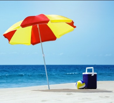 Beach Umbrella and Cooler | Sunset Vacations