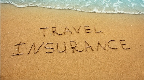 travel insurance written in the sand | Sunset Vacations