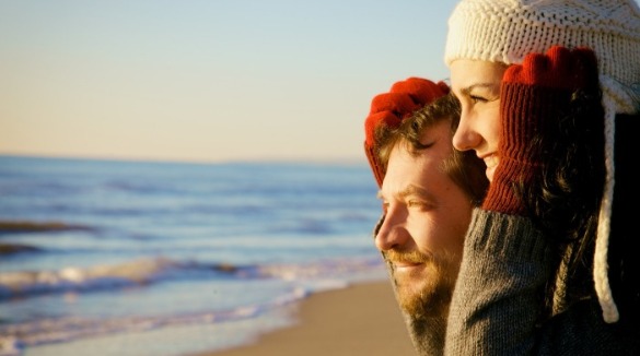 couple on sunset beach in winter | Sunset Vacations